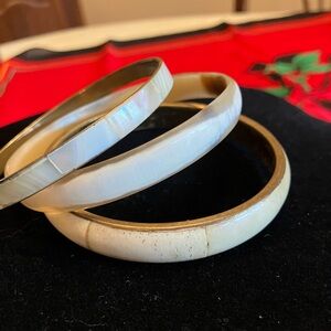Three bangle bracelets